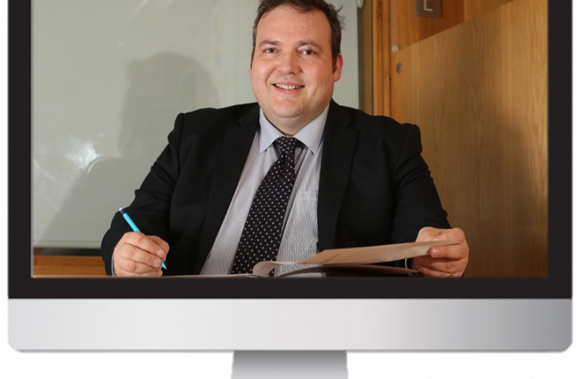 Jamie at his desk