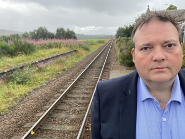 Jamie by a railway line